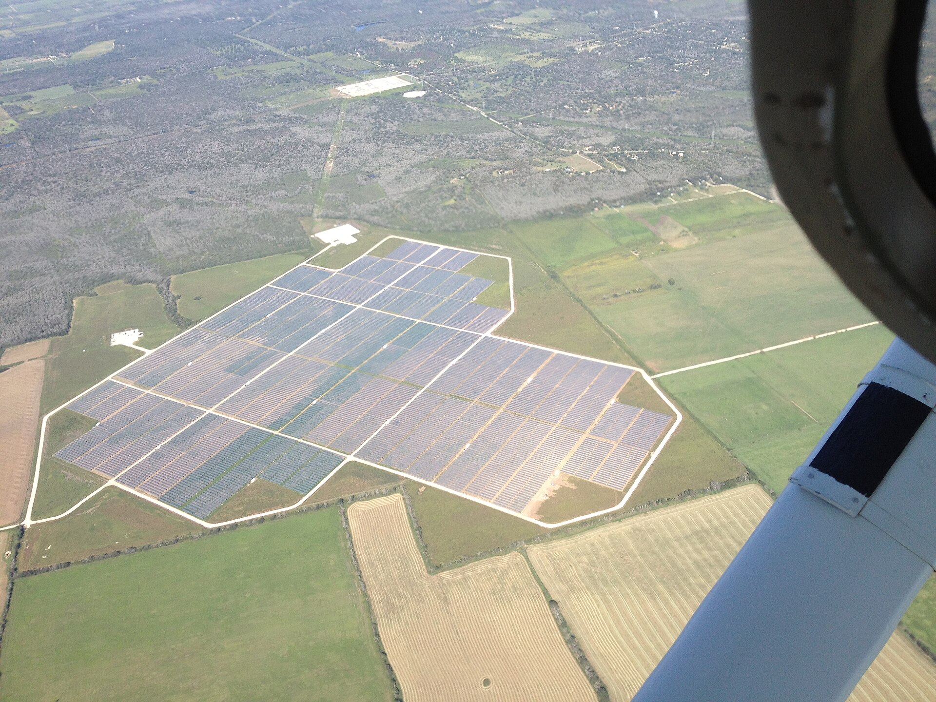 Aerial photograph of a solar farm, not this illustrative case project
